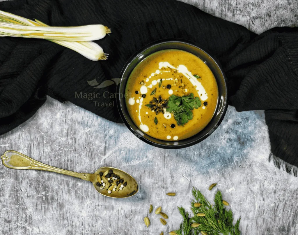 Egyptian Lentil soup mixed with lemon and crunchy bread is a staple meal in the Egyptian cuisine.