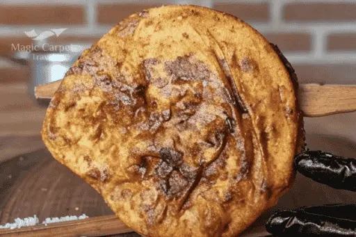 Egyptian Hawawshi is among the best Egyptian dishes list and it is Aish Baladi bread filled with meat and vegetables.